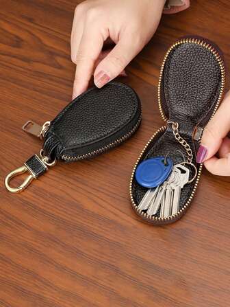 1个便携式椭圆形钥匙包钥匙扣，大容量多功能通用汽车钥匙腰扣包，男女通用，通用钥匙包钥匙链，汽车钥匙圈，返校礼物（请注意，钥匙包由皮革材质制成，可能略有气味。收到后，请将其放置在通风良好的地方，气味会逐渐散去。）