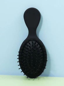1 pieza Peine mini ovalado de plástico negro multifuncional, conveniente para uso en el hogar o al aire libre. Este peine tiene usos versátiles, adecuado para cepillar y peinar el cabello. Es una herramienta de peinado, así como un artículo imprescindible para peluquerías, salones de belleza, temporada de regreso a clases y viajes. Se puede usar para cepillar, peinar y crear diversos peinados. - Negro - Ver 5