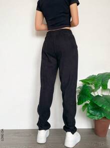 Pantalón semi ajustado estilo pants para dama - Negro - Ver 2