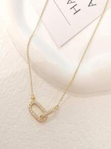 1 pezzo Collana con pendente in acciaio inossidabile, design elegante a fermaglio d'oro, semplice pendente ovale aperto, regalo di gioielleria per ragazze