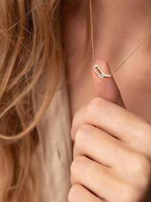 1 pezzo Collana con pendente in acciaio inossidabile, design elegante a fermaglio d'oro, semplice pendente ovale aperto, regalo di gioielleria per ragazze