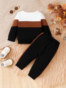 2 pezzi Set maglione a blocchi di colore con motivo a dinosauro e pantaloni per bambini maschi, stile casual scolastico per autunno/inverno