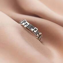 1 件复古银色音符和五角星设计可调节女士缠绕戒指