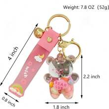 1 pièce Porte-clés créatif en forme d'ours bonbon jelly avec cloche, porte-clés mignon rempli de liquide, convient pour un usage quotidien ou comme cadeau de couple, accessoire de voiture, charm de sac, sac à dos pour l'école