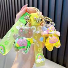 1 pièce Porte-clés créatif en forme d'ours bonbon jelly avec cloche, porte-clés mignon rempli de liquide, convient pour un usage quotidien ou comme cadeau de couple, accessoire de voiture, charm de sac, sac à dos pour l'école