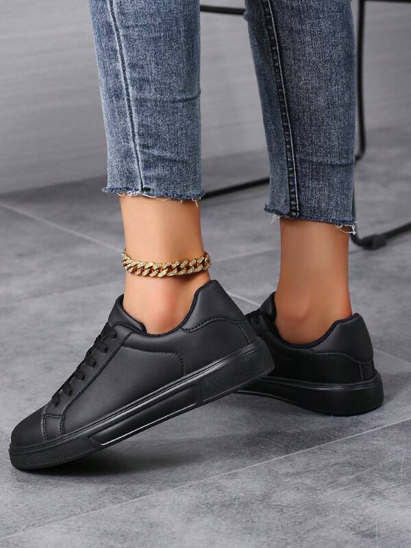Zapatillas deportivas casuales para mujer, zapatillas de lona negra sólida de alta gama unisex, zapatos de skate resistentes al desgaste, ligeros y transpirables para viajes al aire libre