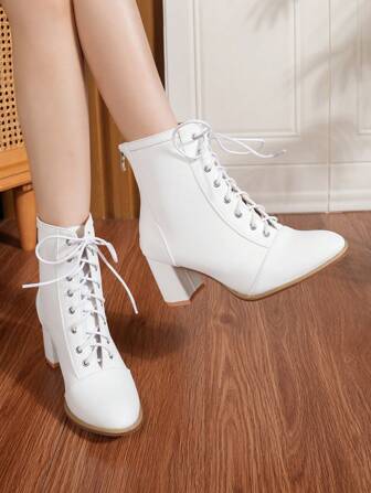 2025秋冬新款欧美性感圆头粗跟纯色百搭踝靴，带拉链和系带设计，女士款