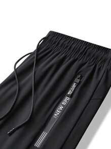 两件装男士时尚宽松运动裤，带拉链口袋，冰丝弹力速干面料，适合徒步、慢跑、骑行、户外健身，反光设计 - 黑色 - 查看 9