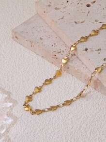Un elegante y minimalista collar de disco circular de acero inoxidable con diseño de copo de nieve chapado en oro de 18K, adecuado para uso diario o fiestas de damas o como regalo para el Día de las Madres