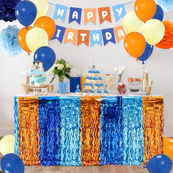 Artigos para festa de aniversário do Blue Dog, incluindo saia de mesa com franjas de papel-alumínio metálico ondulado laranja, azul e azul claro para mesas retangulares e redondas, faixa de feliz aniversário e balões, decoração perfeita para festas temáticas do Blue Dog, Natal