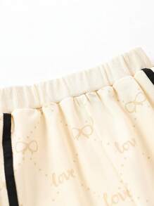 2 件套年轻女孩运动蝴蝶结印花长袖拉链夹克和长裤套装，秋季/春季