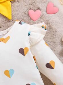 Nouvel ensemble de trois pièces bébé garçon et bébé fille pour le printemps et l'automne: serre-tête avec nœud, body avec motif cœur blanc et pantalon jaune mignon
