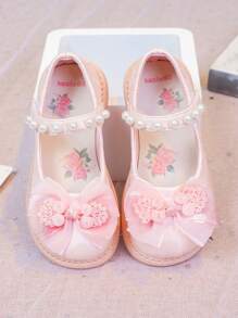 女童平底鞋，淡粉色蝴蝶结扣儿童鞋，奶白色