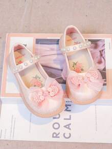 女童平底鞋，淡粉色蝴蝶结扣儿童鞋，奶白色