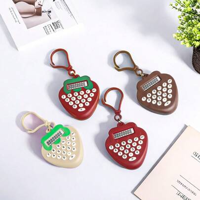 1 pieza Llavero miniatura de calculadora de bolsillo con forma de fresa en diseño de personaje de dibujos animados