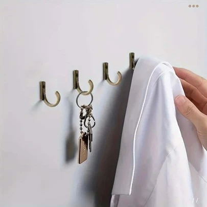 10 Adet Duvara Monte Edilebilir Kanca (Vida Dahil), Kahve Fincanları, Banyo Havluları ve Pijamalar İçin Küçük Bronz Tekli Kancalar, Ayrıca Hafif Montlar, Şapkalar, Anahtarlar ve Aksesuarlar İçin Uygundur - Mutfak, Giriş, Koridor, Yatak Odası, Yurt, Çamaşır Odası, Hobi Alanı, Ev Ofisi, Stüdyo, Dolap Düzenlemesi İçin İdealdir, Yerden Tasarruf Sağlayan Tasarım, Kolay ve Güvenli Montaj, Dayanıklı Metal Yapı, Dekoratif Ama Göze Çarpmayan Görünüm