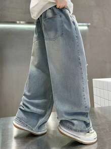 Gerade geschnittene zerrissene gewaschene Denim für Teenager-Jungen, locker sitzende Hosen mit weitem Bein