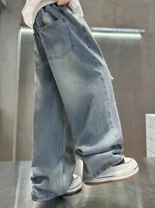 Gerade geschnittene zerrissene gewaschene Denim für Teenager-Jungen, locker sitzende Hosen mit weitem Bein