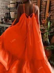 Vestido largo con cuello en V sin mangas, con volantes en el bajo y bolsillos