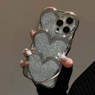 2.0CM Shockproof TPU Electroplated Glitter Hollow Heart Elegant Dopamine Phone Case Compatible With IPhone 11, 12, 12 Pro, 12 Pro Max, 13, 14, 13 Pro Max, 14 Pro Max, 15 Pro Max, 16, 16 Pro, 16 Plus, 16 Pro Max