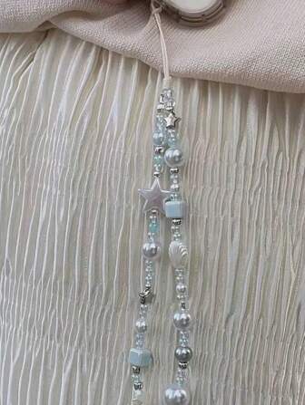 手工制作的 INS 风格海盐和星形贝壳手机挂绳串珠 DIY 相机饰品