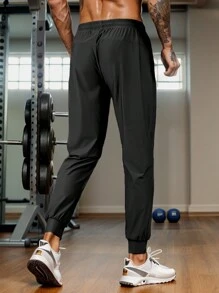 男士舒适高弹力休闲裤，带拉链口袋和可调节腰部，适合夏季运动和训练，可机洗，带反光设计