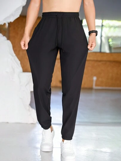 男士速干宽松轻便运动裤抽绳腰部透气休闲七分裤