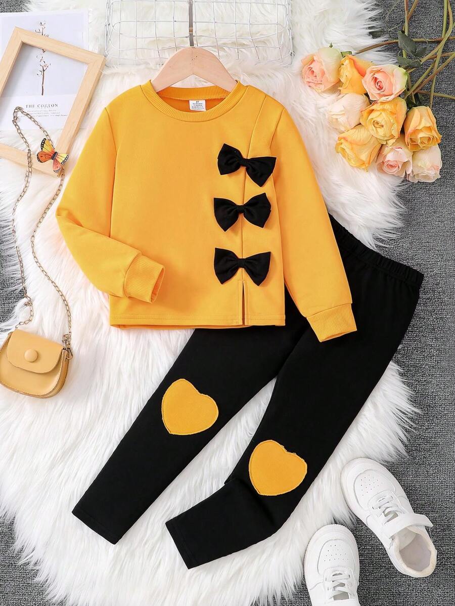 2pcs Young Girl Casual Fashion Spring Autumn Set, Featuring Solid Color Patchwork Design With Bow Accent, Ribbed Cuffs Crew Neck Knitted Top And Heart Pattern Elastic Waist Straight Leg Pants, Soft And Comfortable Chic Casual Outfit For Girls, Elementary School Daily Use Apparel For Fall - Yellow - View 1