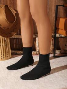 Black Sock-Covered Mid-Calf Boots With Small Square Toe And Flat Heels. Comfortable And Lightweight For Daily Wear. Fashionable And