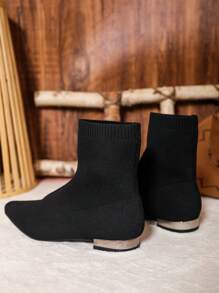 Black Sock-Covered Mid-Calf Boots With Small Square Toe And Flat Heels. Comfortable And Lightweight For Daily Wear. Fashionable And