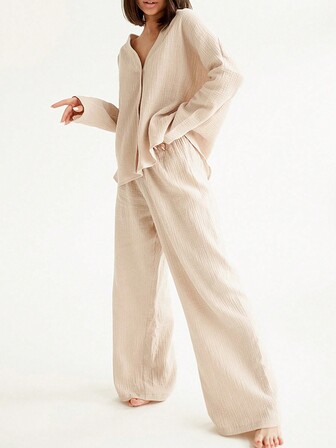 Tuta casual casalinga da donna con top a maniche lunghe e scollo a V, e pantaloni lunghi