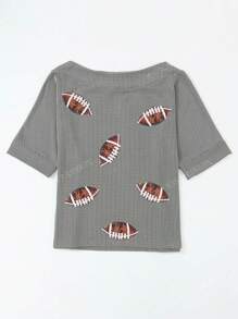 Blouse avec manches chauve-souris à cordonnet, encolure bateau avec motif rugby pailleté