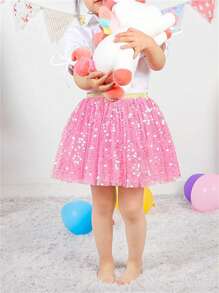 Falda mini decorativa para niña joven con malla brillante y decoración con lentejuelas