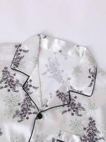 Dwuczęściowy zestaw męski jedwabny wzór kwiatowy nadruk satyna czarna obramowanie kieszeń długi rękaw top ze spodniami piżama zestaw - Wielokolorowe - Zobacz 3