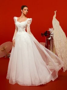 Vestido de novia blanco vintage de encaje de manga larga, espalda descubierta, corte evasé y tren con detalles de red barroca - Blanco - Ver 6