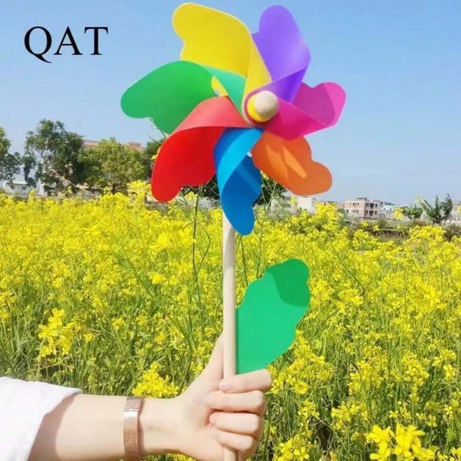 Große, bunte hölzerne StangenWindmühle als Handspielzeug für den