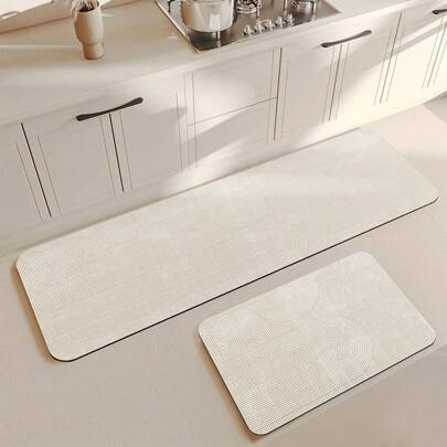 This Long Rectangular Mat, Designed In The Japanese Wabi-Sabi Style, Features Minimalist Lines And Is Specially Made For The Kitchen. Crafted From Diatomaceous Earth, It Has Strong Water Absorption, Is Washable, And Slip-Resistant, Making It Suitable For The Kitchen, Bathroom, Entryway, And Laundry Room. Suitable For All Seasons, It Is Also An Ideal Choice For Various Holiday Celebrations.