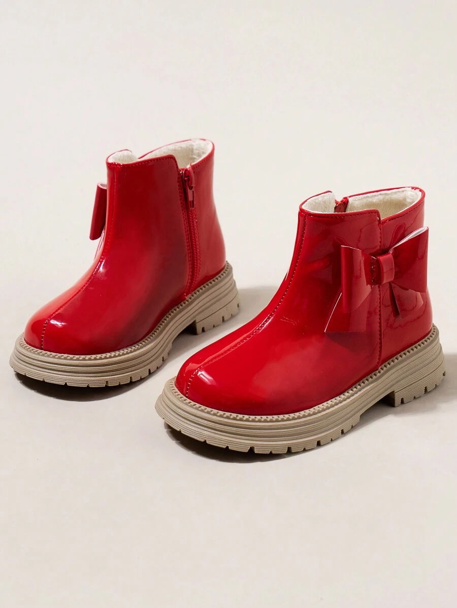 1双冬季必备红色儿童防滑靴,侧面带拉链,方便穿脱。鞋跟饰有蝴蝶结时尚公主款厚底儿童3-12岁时尚踝靴适合室内外日常穿着 - 紅色 - 查看 1