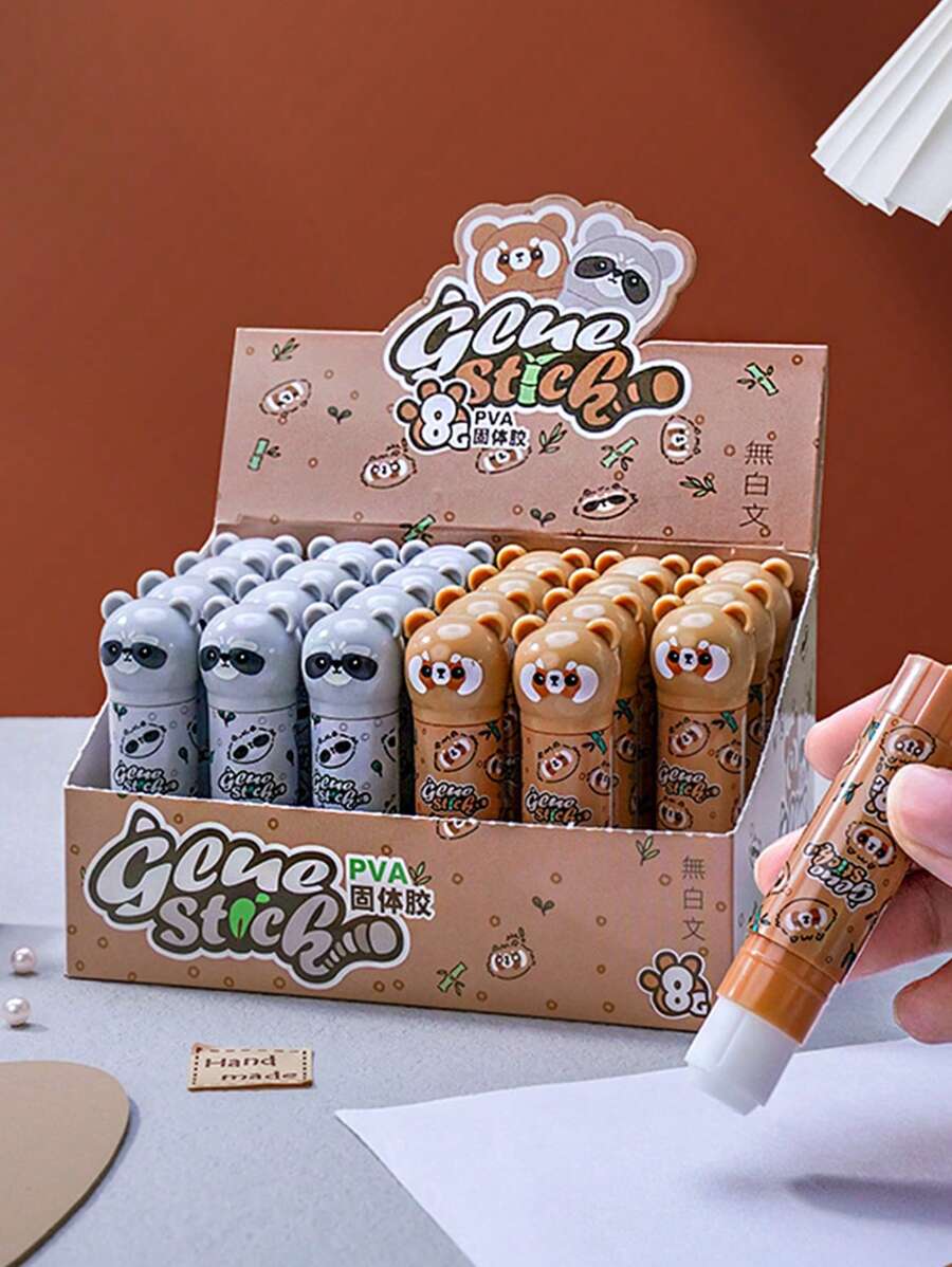 1 pieza (8g) Barra de pegamento sólido de PVA con diseño de mapache de dibujos animados para pegar papel, sobres, recibos, tarjetas, exámenes, notas, diario DIY, papelería escolar y de oficina