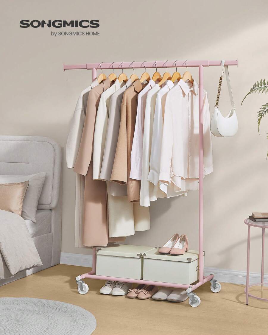 SONGMICS Clothes Rack On Wheels, Heavy Duty Clothes Rail, With Extendable Hanging Rail, 90 Kg Load Capacity, Easy Assembly, Portable Halloween Decorations Halloween Costumes Autumn Decor Festival Decor - Baby Pink - View 1