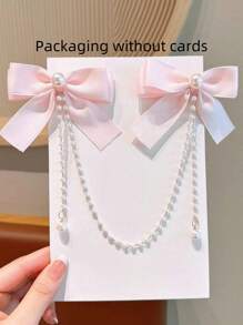 1pc Girls' Fashion Sweet Pearl Bow Decor Pearl Tassel Hair Clip. Slight Color Difference Between Card And Actual Item Is Normal Due To Batch Difference, Actual Item Prevails. Pearl Quantity Is Random.