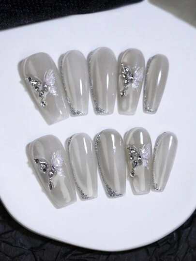 10片棺材形长款银色闪光亮片蝴蝶冰玉光泽猫眼美甲贴片，100%纯手工制作，法式简约优雅假指甲贴片，可重复使用，适合女性DIY新娘美甲。