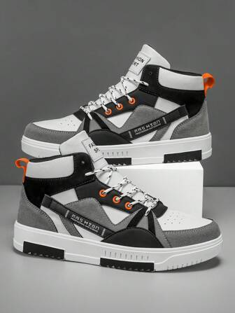 Zapatillas casuales de caballero con cordones y caña alta, diseño colorblock con letra estilizada, calzado deportivo cómodo para correr, versátil