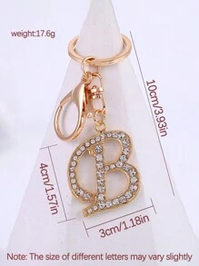 1 st., vergulde en met strass versierde eerste letter sleutelhanger, schattige strass sleutelhanger, geschikt voor dagelijks gebruik, geschikt voor zowel mannen als vrouwen, ringtas, sleutelhanger, rugzakhanger, cadeaus voor vrouwen en meisjes, portemonnee en handtas accessoires, eerste letter A-Z