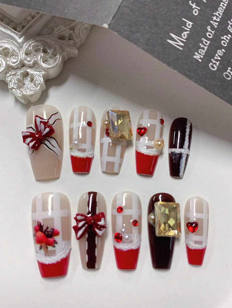10 Pieces Medium-Length Coffin-Shaped Handmade Exquisite False Nails In Autumn And Winter Red, Curved French Edge Design, Strawberry Stripe Print, Champagne Square Rhinestone Bow Heart Small Rhinestone Jewelry Stickers, New Year Christmas Style, Fashionable Nail Set, Holiday Party, Daily Wear, Suitable For Women & Girls, Comes With Jelly Glue And Rubbing Strips. Press On Nails Nail Supplies Nails