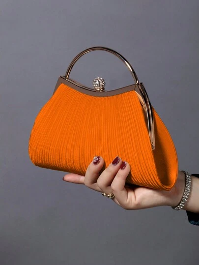 REMANLAND 这款闪耀夺目、优雅迷人的单钻装饰时尚金属手拿包/晚宴包，适合女士出席派对、婚礼、盛会及其他场合。这款晚宴包是派对女孩和女士的完美之选，也是馈赠女性的绝佳礼物。它与节日派对礼服、晚礼服和亮片连衣裙完美搭配。这款时尚派对包是派对、婚礼、舞会、盛会的理想之选，并可与舞会配饰完美搭配。