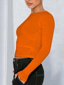 Áo thun nữ tay dài cổ tròn dáng ngắn, màu trơn, phong cách tối giản, ôm sát, mang hơi hướng Y2K gợi cảm, thích hợp cho mùa xuân/thu. - trái cam - Xem 7