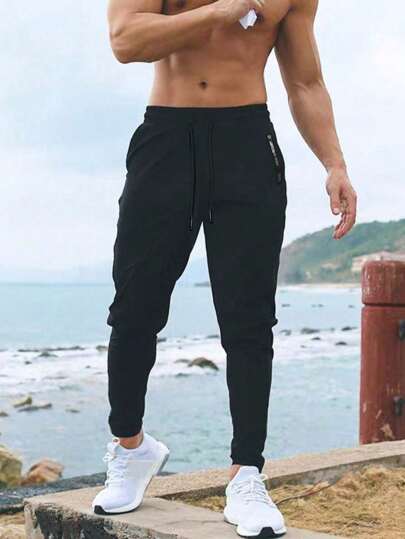 1pc Men's Quick Dry Loose Drawstring Sports Pants, Solid Color Workout Gym Casual Trousers