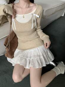 RUIWY Women's Sweet Bowknot Designed Colorblock Long Sleeved Slim Fitted Sweater Round Neck Pullover Top For Autumn