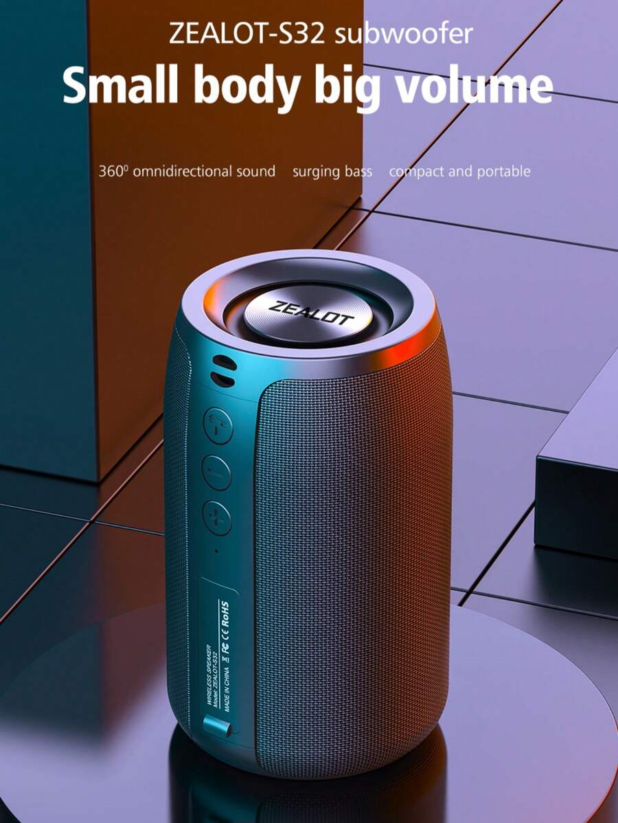 Zealot S32 无线音箱，10W 功率，户外便携式低音炮，IPX5 防水，支持双设备配对，立体环绕声，强劲低音。包含充电线和音频线，兼容 FM/TF/USB 卡。